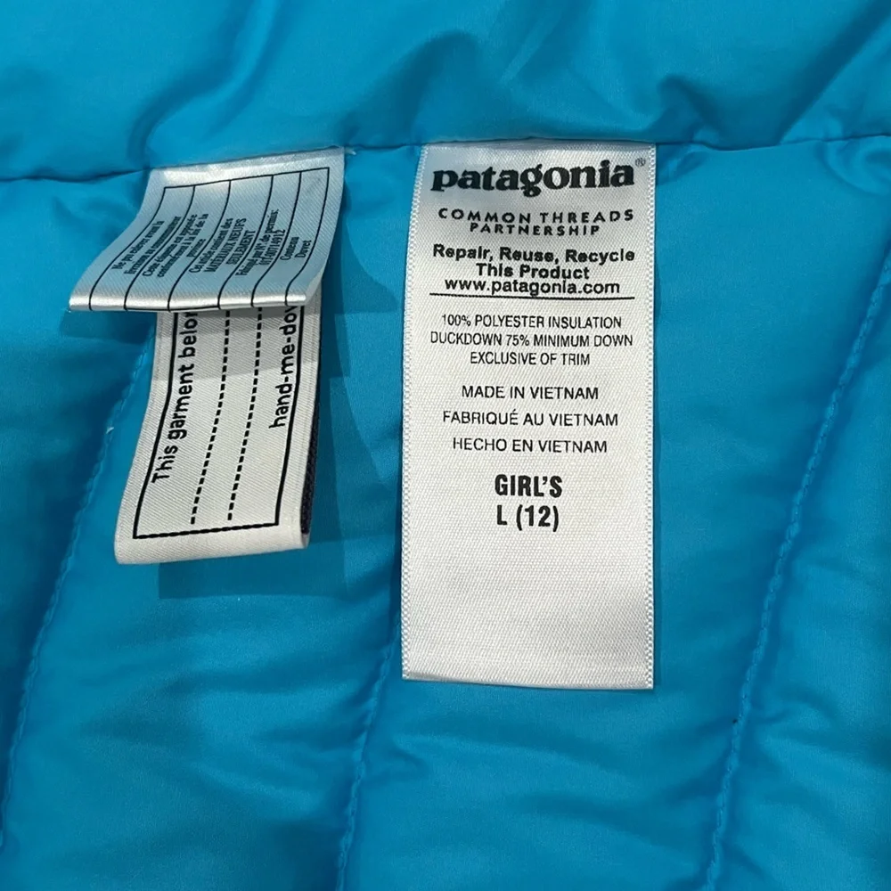 Patagonia girls 12 L down puffer vest bright aqua blue and pink details